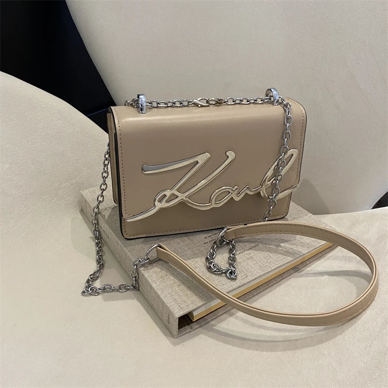 Fashionable Women’s Crossbody Bag – Solid Color Shoulder Bag with Metal Letter Logo & Chain-Link Strap