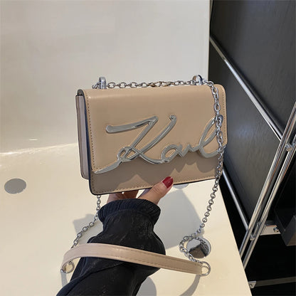 Fashionable Women’s Crossbody Bag – Solid Color Shoulder Bag with Metal Letter Logo & Chain-Link Strap
