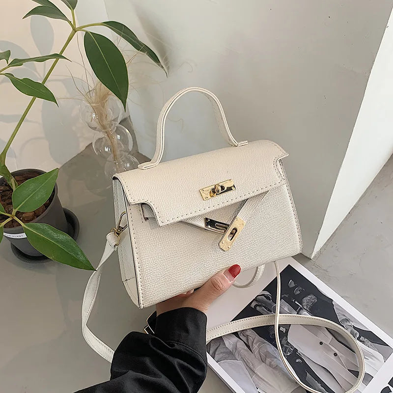 Style Women’s Shoulder Bag with Lock Closure – Trendy Embossed Crossbody Bag for Women