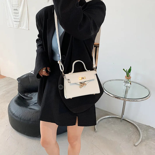Style Women’s Shoulder Bag with Lock Closure – Trendy Embossed Crossbody Bag for Women